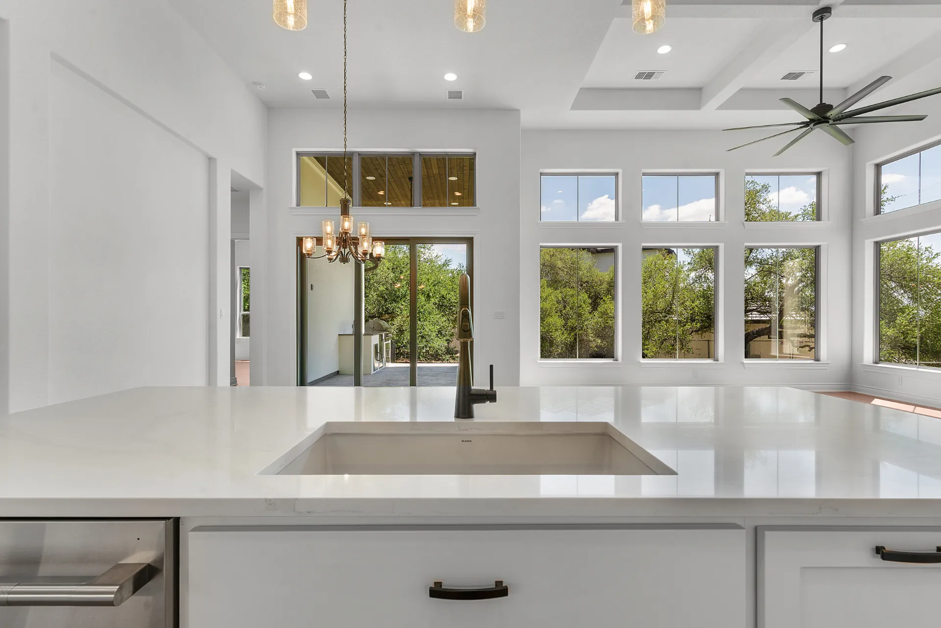 Kitchen island sink looking into living area