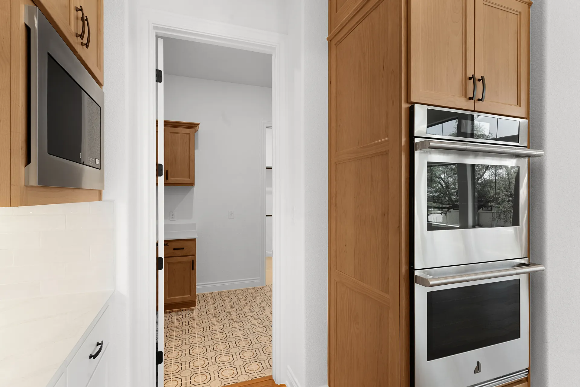 JennAir double ovens and ceiling-height cabinetry